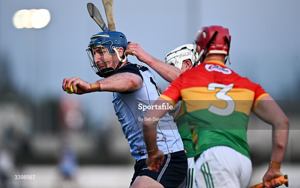 21 March 2026; John Hetherton of Dublin in action against Carlow players Kevin McDonald and Dion Wall during the Allianz Hurling League Division 1B match between Carlow and Dublin at Netwatch Cullen Park in Carlow. Photo by Seb Daly/Sportsfile