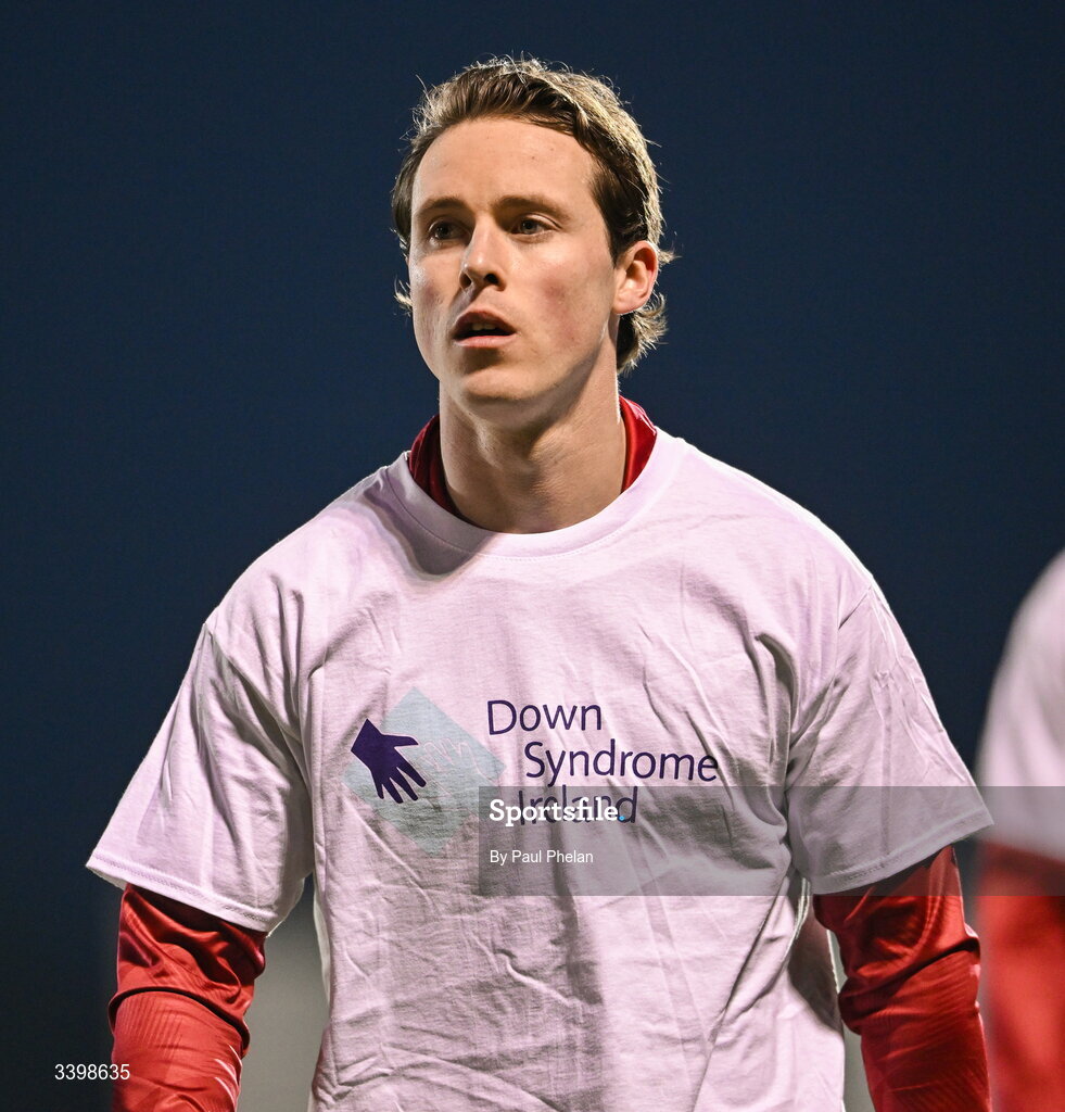 21 March 2026; Will Fitzgerald of Sligo Rovers wears a Down Syndrome Ireland t-shirt while warming up before the SSE Airtricity Men's Premier Division match between Sligo Rovers and Shelbourne at The Showgrounds in Sligo. Photo by Paul Phelan/Sportsfile