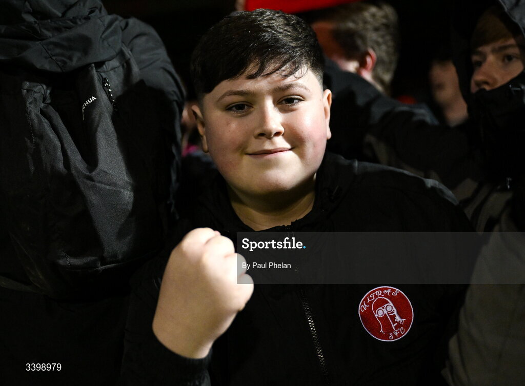 21 March 2026; A Shelbourne supporter celebrates after the SSE Airtricity Men's Premier Division match between Sligo Rovers and Shelbourne at The Showgrounds in Sligo. Photo by Paul Phelan/Sportsfile