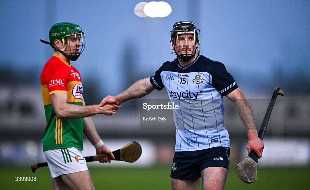21 March 2026; Cian O’Sullivan of Dublin and Fiach Ó Toole of Carlow after during the Allianz Hurling League Division 1B match between Carlow and Dublin at Netwatch Cullen Park in Carlow. Photo by Seb Daly/Sportsfile