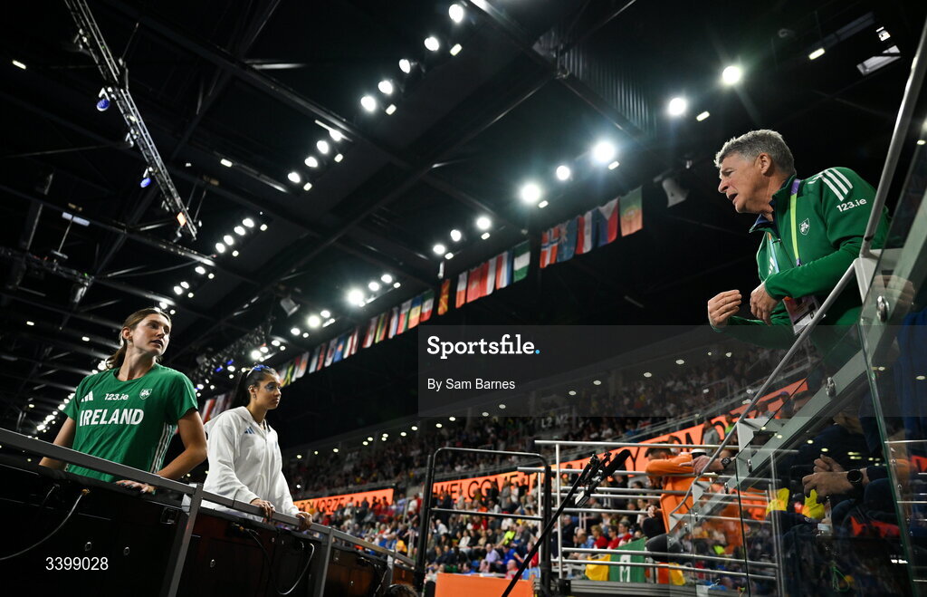 22 March 2026; Coach and father of Kate O'Connor, Michael O'Connor, in conversation with his daughter Kate O'Connor of Ireland before she competes in the Women's high jump in the Women's Pentathlon during day three of the World Athletics Indoor Championships at Kujawsko-Pomorska Arena in Torun, Poland. Photo by Sam Barnes/Sportsfile