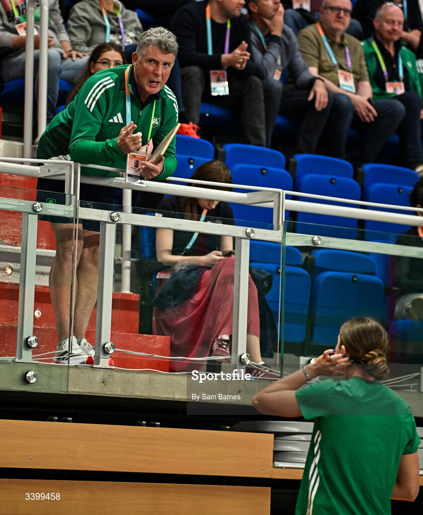 22 March 2026; Kate O'Connor of Ireland in conversation with her father and coach Michael O'Connor before competing in the Women's shot put event in the Women's Pentathlon during day three of the World Athletics Indoor Championships at Kujawsko-Pomorska Arena in Torun, Poland. Photo by Sam Barnes/Sportsfile