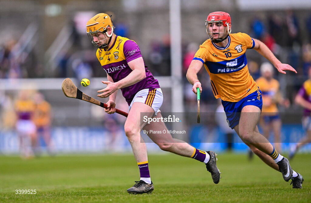 8 March 2026; Simon Donohoe of Wexford in action against Jack Kirwan of Clare during the Allianz Hurling League Division 1B match between Clare and Wexford at Zimmer Biomet Páirc Chíosóg in Ennis, Clare. Photo by Piaras Ó Mídheach/Sportsfile