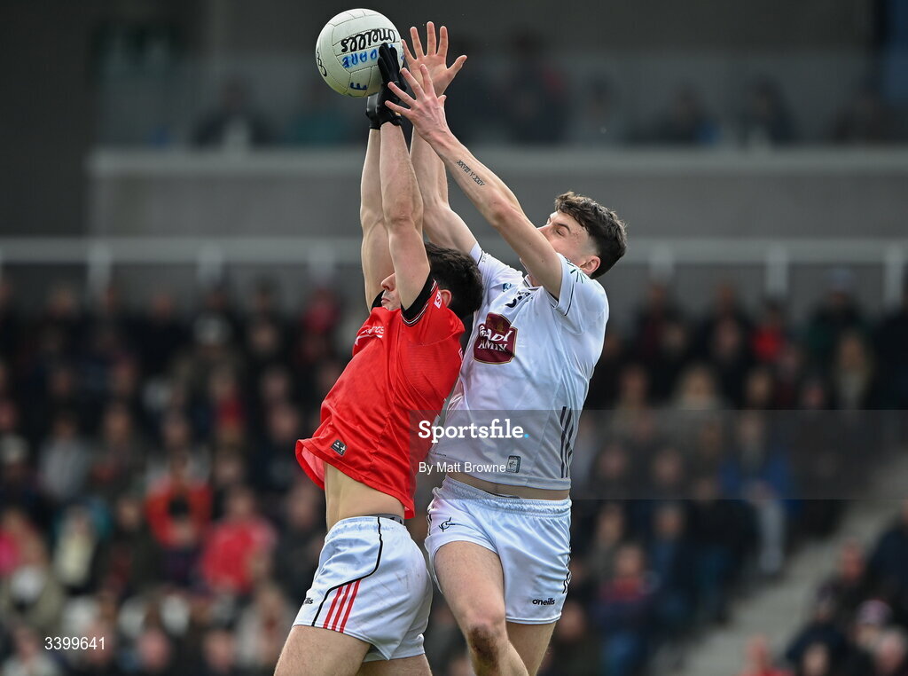 22 March 2026; Emmet Carolan of Louth in action against Ben Loakman of Kildare during the Allianz Football League Division 2 match between Kildare and Louth at Cedral St Conleth's Park in Newbridge, Kildare. Photo by Matt Browne/Sportsfile