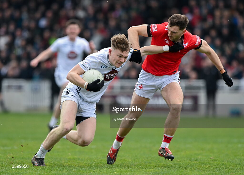 22 March 2026; Colm Moran of Kildare in action against Sam Milroy of Louth during the Allianz Football League Division 2 match between Kildare and Louth at Cedral St Conleth's Park in Newbridge, Kildare. Photo by Matt Browne/Sportsfile