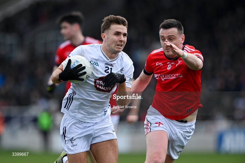 22 March 2026; Tommy Gill of Kildare in action against Tommy Durnin of Louth during the Allianz Football League Division 2 match between Kildare and Louth at Cedral St Conleth's Park in Newbridge, Kildare. Photo by Matt Browne/Sportsfile