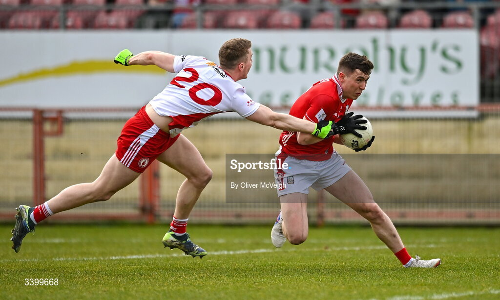 22 March 2026; Luke Fahy of Cork in action against Ben McDonnell of Tyrone during the Allianz Football League Division 2 match between Tyrone and Cork at O'Neills Healy Park in Omagh, Tyrone. Photo by Oliver McVeigh/Sportsfile