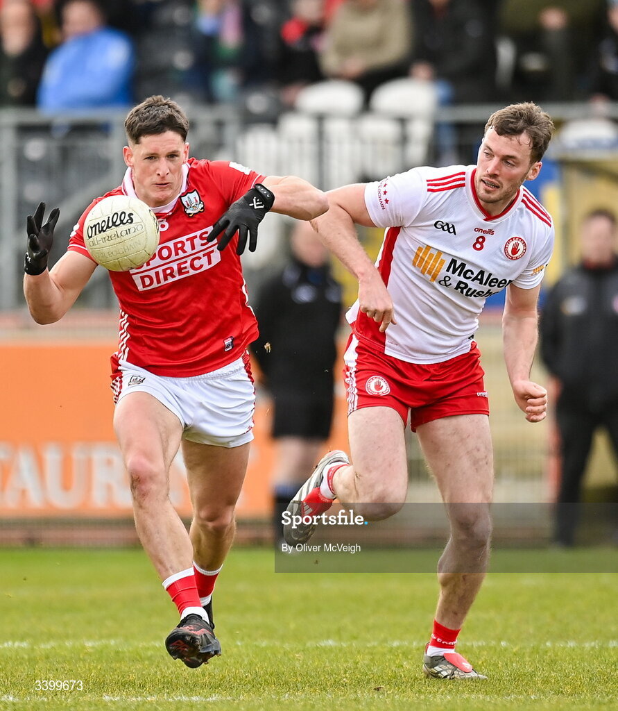 22 March 2026; Colm O'Callaghan of Cork in action against Brian Kennedy of Tyrone during the Allianz Football League Division 2 match between Tyrone and Cork at O'Neills Healy Park in Omagh, Tyrone. Photo by Oliver McVeigh/Sportsfile