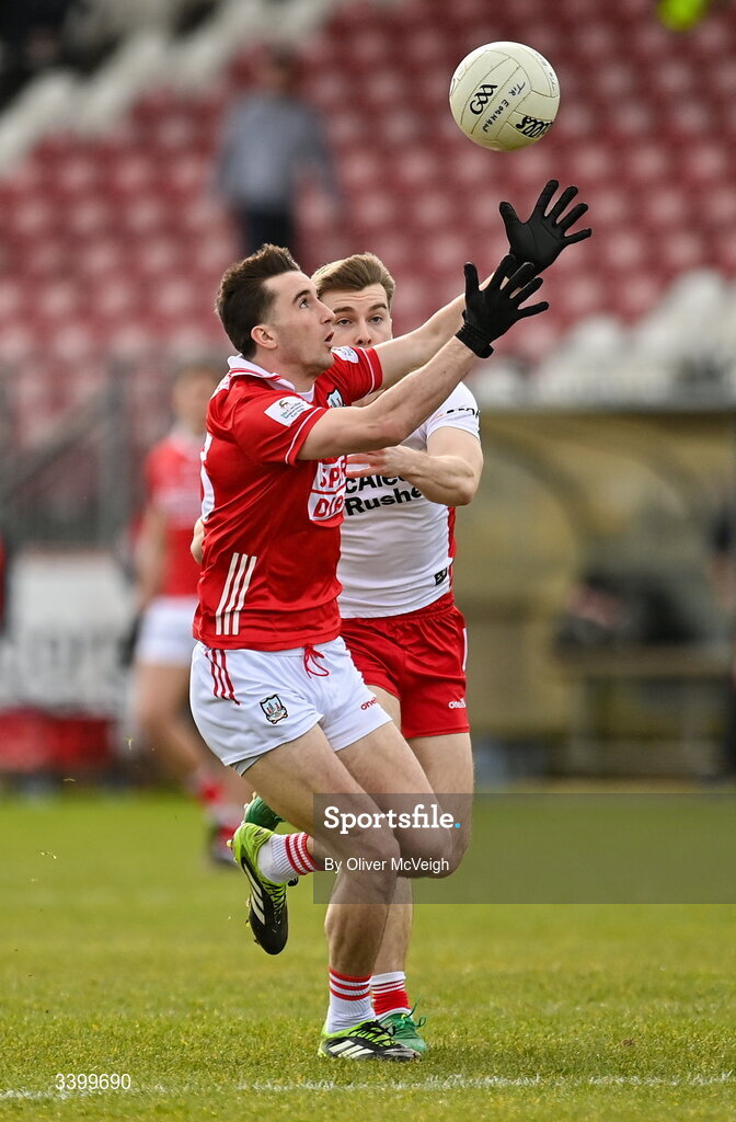 22 March 2026; Chris Og Jones of Cork in action against Peter Teague of Tyrone during the Allianz Football League Division 2 match between Tyrone and Cork at O'Neills Healy Park in Omagh, Tyrone. Photo by Oliver McVeigh/Sportsfile