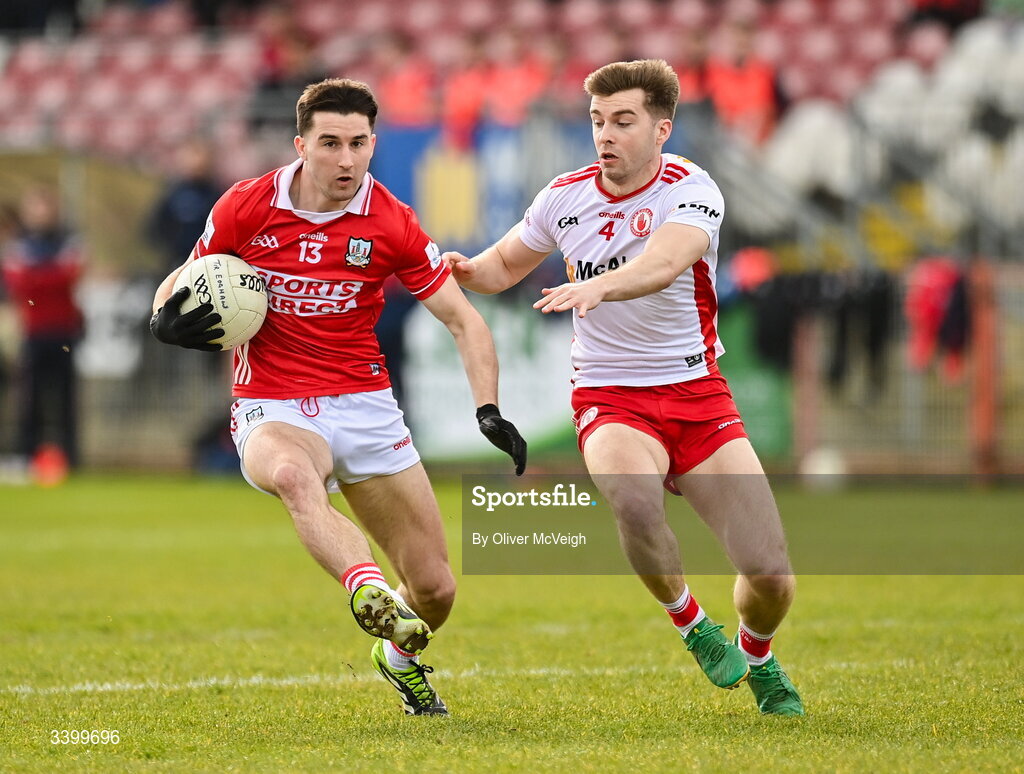 22 March 2026; Chris Og Jones of Cork in action against Peter Teague of Tyrone during the Allianz Football League Division 2 match between Tyrone and Cork at O'Neills Healy Park in Omagh, Tyrone. Photo by Oliver McVeigh/Sportsfile