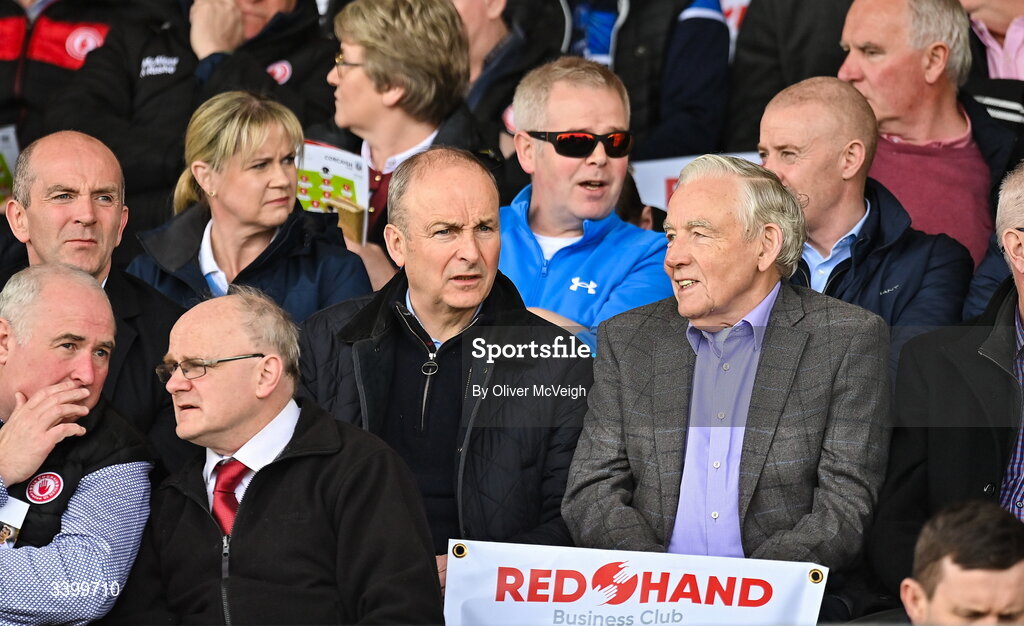 22 March 2026; An Taoiseach Micheál Martin TD along with Tyrone sponsor Seamus McAleer during the Allianz Football League Division 2 match between Tyrone and Cork at O'Neills Healy Park in Omagh, Tyrone. Photo by Oliver McVeigh/Sportsfile