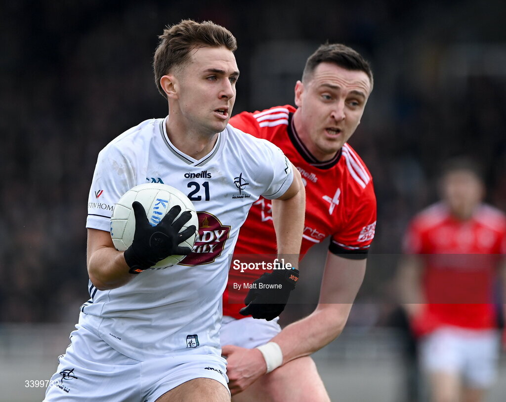 22 March 2026; Tommy Gill of Kildare in action against Tommy Durnin of Louth during the Allianz Football League Division 2 match between Kildare and Louth at Cedral St Conleth's Park in Newbridge, Kildare. Photo by Matt Browne/Sportsfile