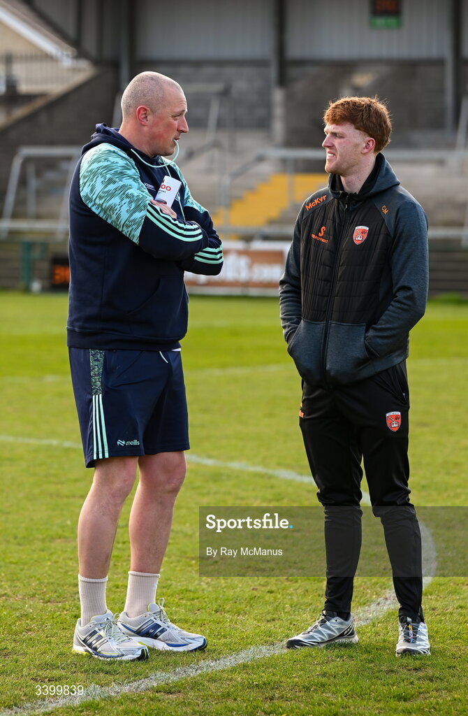 22 March 2026; Kerry selector and coach, and formerly of Armagh, Kieran Donaghy, left, in conversation with injured Armagh player Ciaran Macken before the Allianz Football League Division 1 match between Armagh and Kerry at BOX-IT Athletic Grounds in Armagh. Photo by Ray McManus/Sportsfile