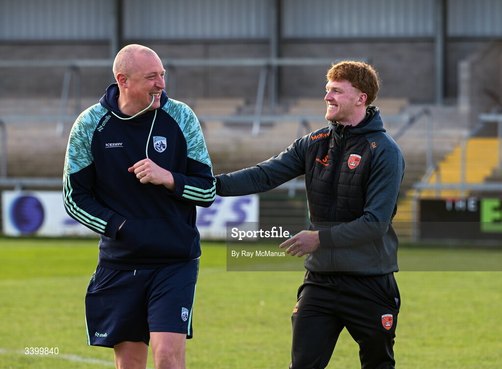 22 March 2026; Kerry selector and coach, and formerly of Armagh, Kieran Donaghy, left, in jocular mood with injured Armagh player Ciaran Macken before the Allianz Football League Division 1 match between Armagh and Kerry at BOX-IT Athletic Grounds in Armagh. Photo by Ray McManus/Sportsfile