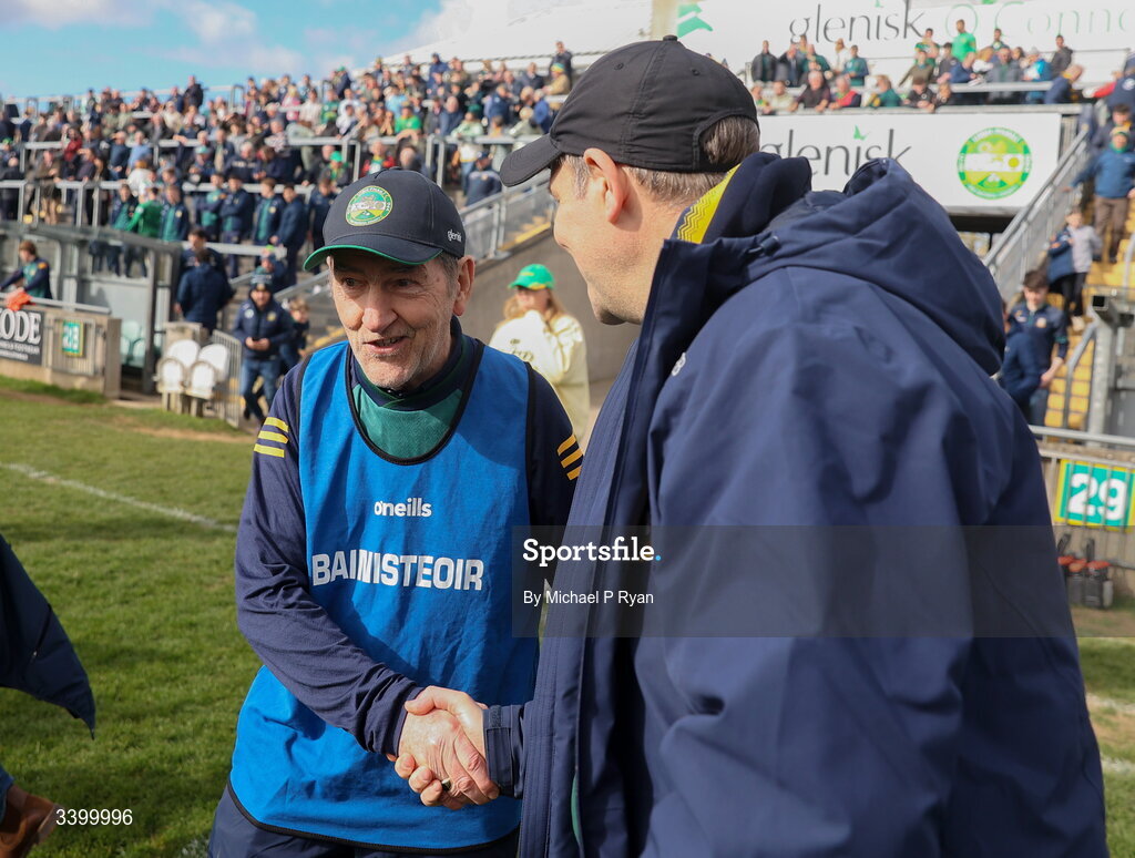 22 March 2026; Meath manager Robbie Brennan shakes hands with Offaly joint-manager Mickey Harte after the Allianz Football League Division 2 match between Offaly and Meath at Glenisk O'Connor Park in Tullamore, Offaly. Photo by Michael P Ryan/Sportsfile