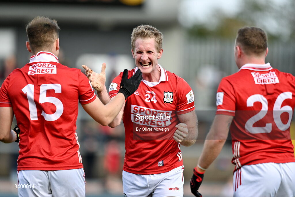 22 March 2026; Ruairi Deane of Cork celebrates with Steven Sherlock and Brian Hurley of Cork after the Allianz Football League Division 2 match between Tyrone and Cork at O'Neills Healy Park in Omagh, Tyrone. Photo by Oliver McVeigh/Sportsfile