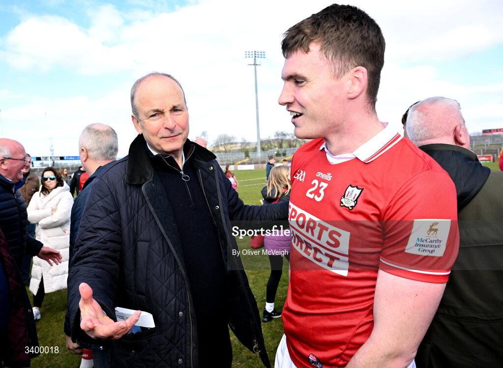 22 March 2026; An Taoiseach Micheál Martin TD along with David Buckley of Cork after the Allianz Football League Division 2 match between Tyrone and Cork at O'Neills Healy Park in Omagh, Tyrone. Photo by Oliver McVeigh/Sportsfile