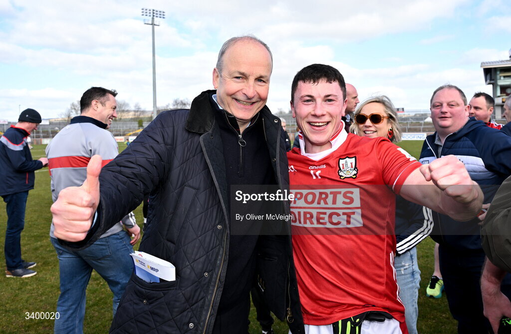 22 March 2026; An Taoiseach Micheál Martin TD along with David Buckley of Cork after the Allianz Football League Division 2 match between Tyrone and Cork at O'Neills Healy Park in Omagh, Tyrone. Photo by Oliver McVeigh/Sportsfile