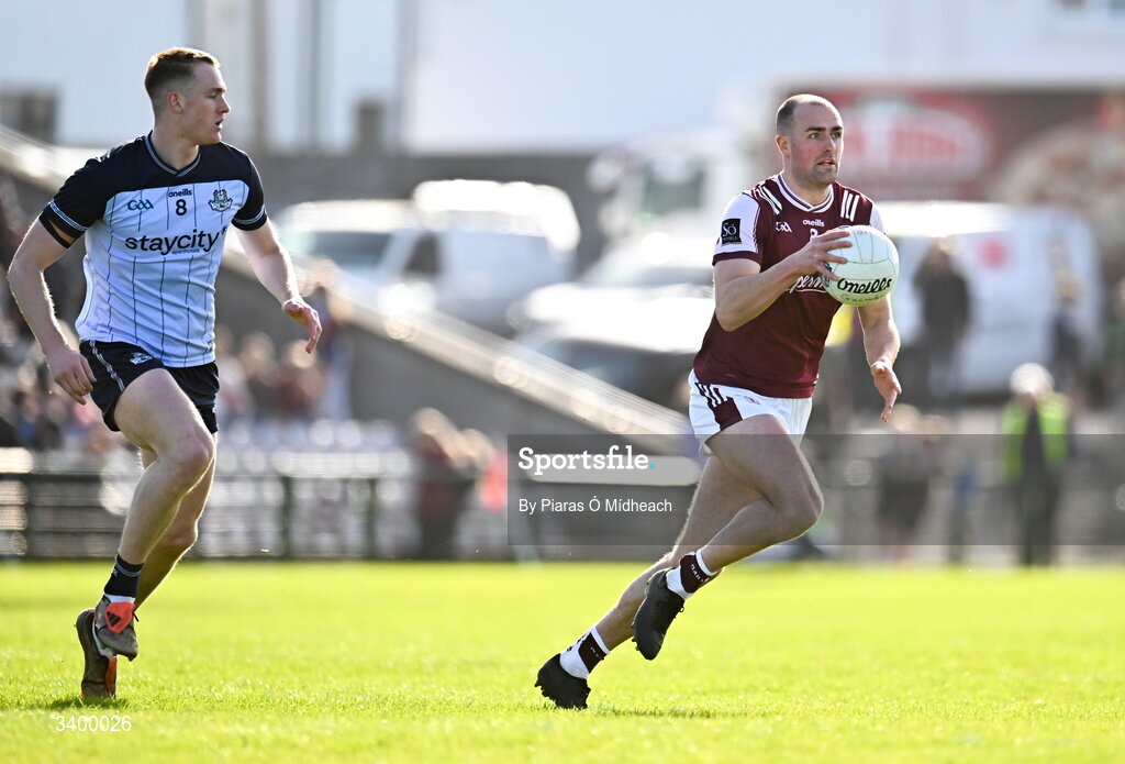 22 March 2026; John Maher of Galway gets away from Peadar Ó Cofaigh Byrne of Dublin during the Allianz Football League Division 1 match between Galway and Dublin at Pearse Stadium in Galway. Photo by Piaras Ó Mídheach/Sportsfile