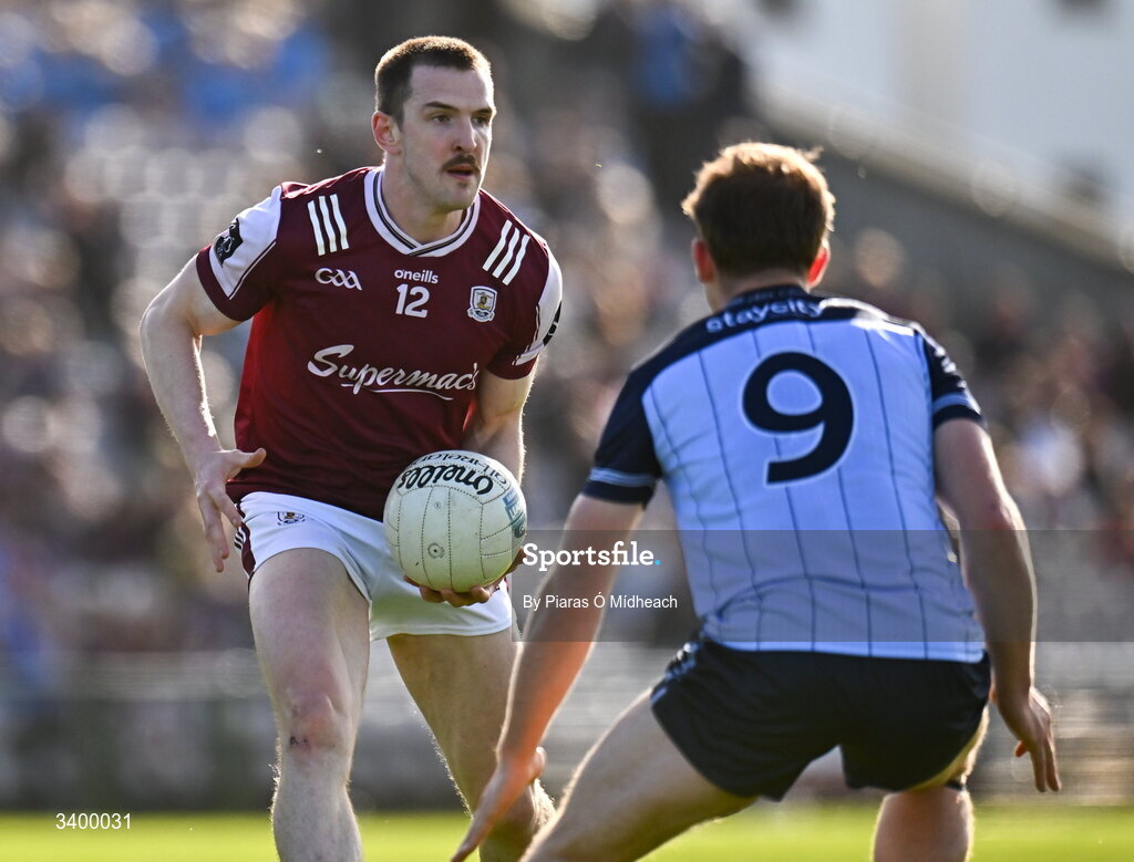 22 March 2026; Céin D'Arcy of Galway in action against Charlie McMorrow of Dublin during the Allianz Football League Division 1 match between Galway and Dublin at Pearse Stadium in Galway. Photo by Piaras Ó Mídheach/Sportsfile