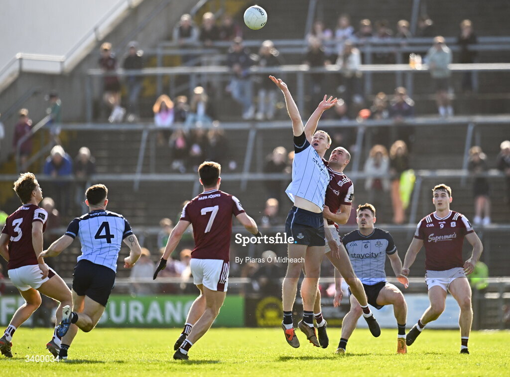 22 March 2026; Peadar Ó Cofaigh Byrne of Dublin in action against John Maher of Galway during the Allianz Football League Division 1 match between Galway and Dublin at Pearse Stadium in Galway. Photo by Piaras Ó Mídheach/Sportsfile