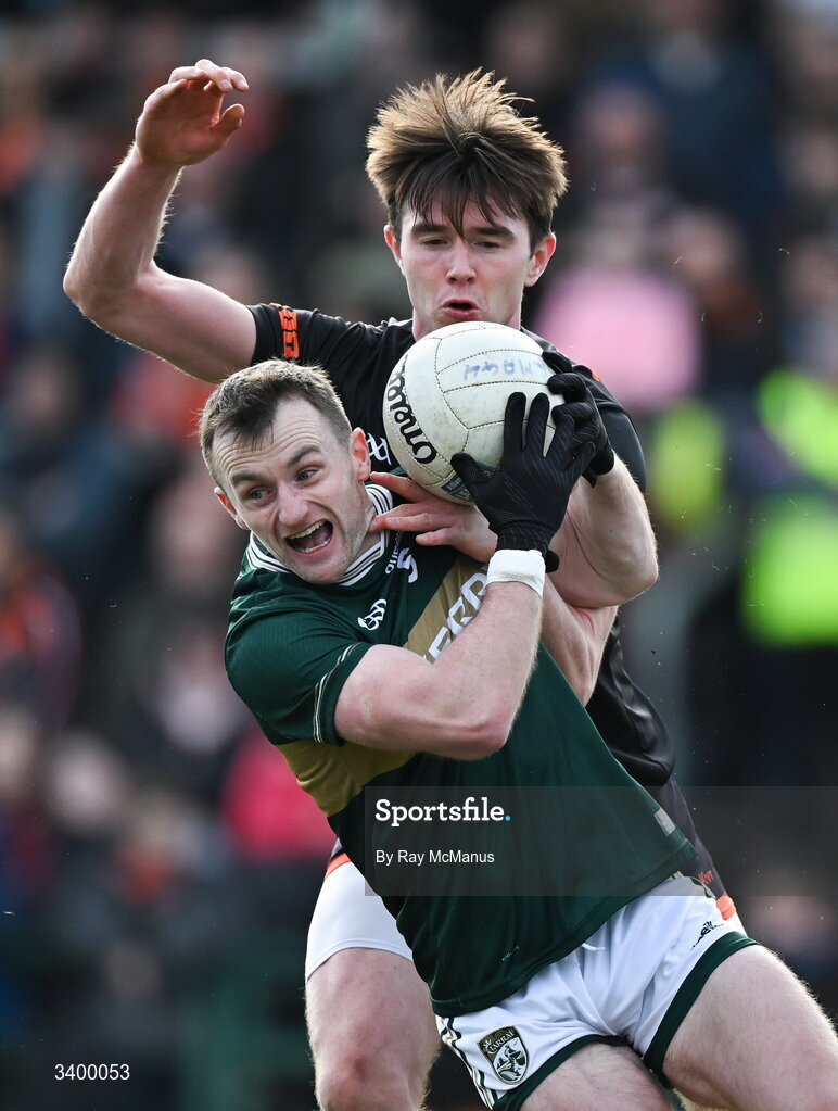 22 March 2026; Tom O'Sullivan of Kerry is tackled by Ben Crealey of Armagh during the Allianz Football League Division 1 match between Armagh and Kerry at BOX-IT Athletic Grounds in Armagh. Photo by Ray McManus/Sportsfile