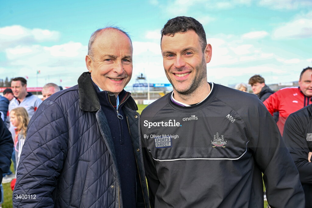 22 March 2026; An Taoiseach Micheál Martin TD along with his son Michael Aodh Martin of Cork after the Allianz Football League Division 2 match between Tyrone and Cork at O'Neills Healy Park in Omagh, Tyrone. Photo by Oliver McVeigh/Sportsfile