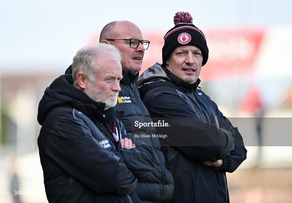 22 March 2026; Tyron Manager Malachy O'Rourke, centre, along with assistants Leo McBride and Ryan Porter during the Allianz Football League Division 2 match between Tyrone and Cork at O'Neills Healy Park in Omagh, Tyrone. Photo by Oliver McVeigh/Sportsfile