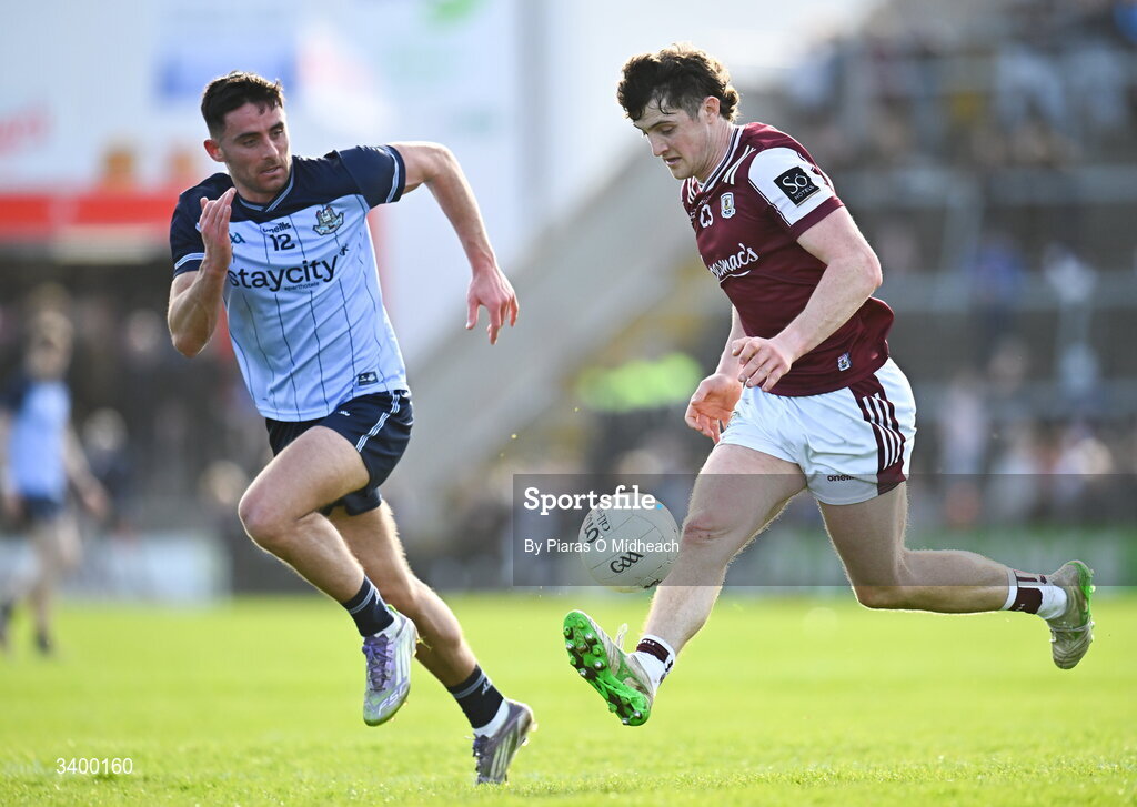 22 March 2026; Kieran Molloy of Galway in action against Niall Scully of Dublin during the Allianz Football League Division 1 match between Galway and Dublin at Pearse Stadium in Galway. Photo by Piaras Ó Mídheach/Sportsfile