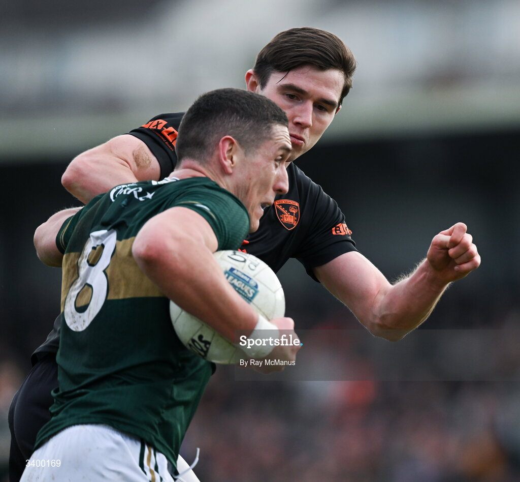22 March 2026; Joe O'Connor of Kerry is tackled by Ben Crealey of Armagh during the Allianz Football League Division 1 match between Armagh and Kerry at BOX-IT Athletic Grounds in Armagh. Photo by Ray McManus/Sportsfile