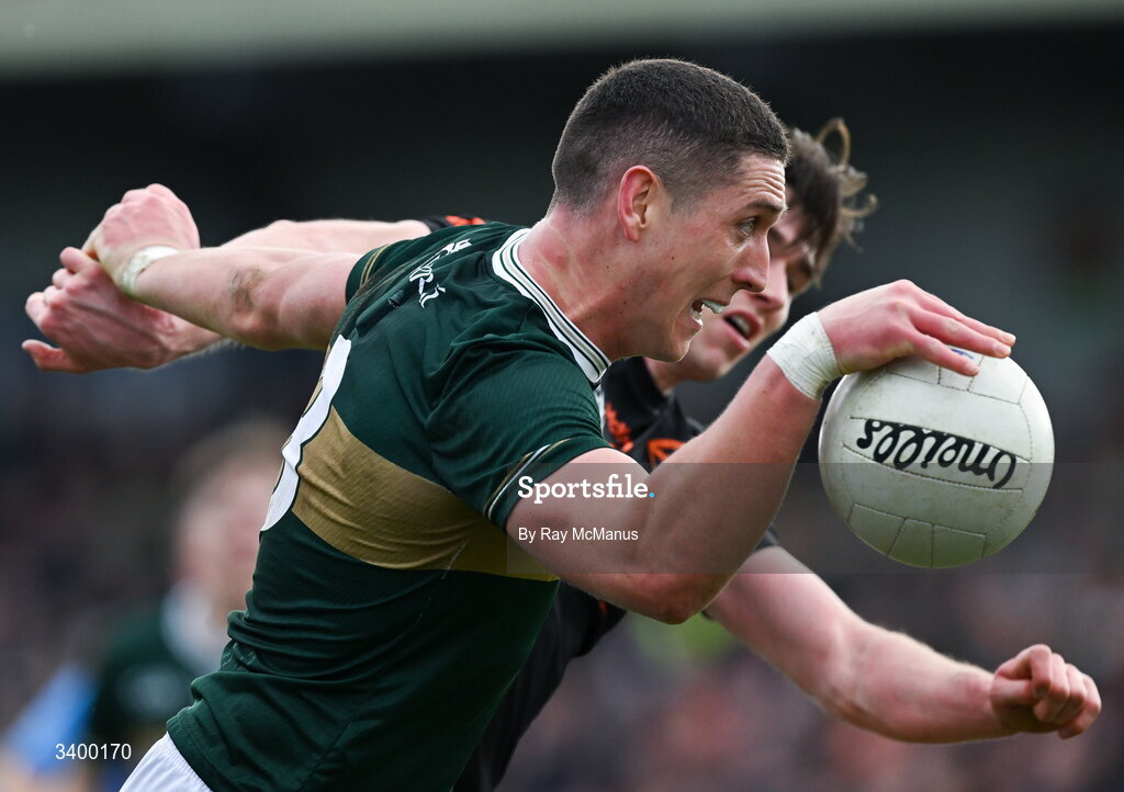 22 March 2026; Joe O'Connor of Kerry is tackled by Ben Crealey of Armagh during the Allianz Football League Division 1 match between Armagh and Kerry at BOX-IT Athletic Grounds in Armagh. Photo by Ray McManus/Sportsfile