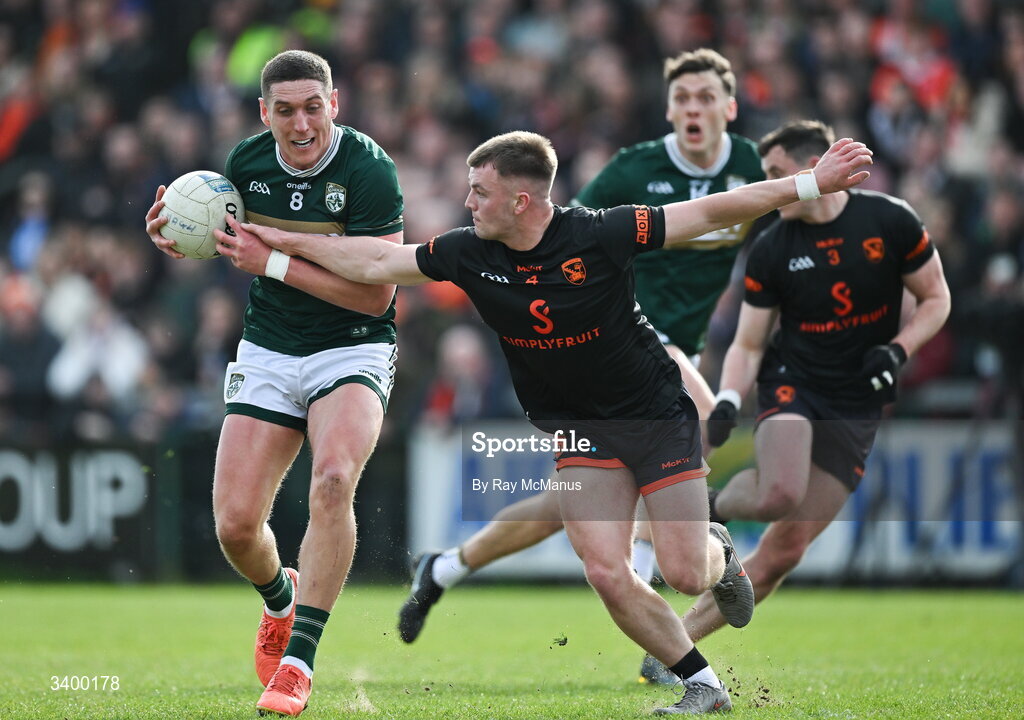 22 March 2026; Joe O'Connor of Kerry is tackled by Peter McGrane of Armagh during the Allianz Football League Division 1 match between Armagh and Kerry at BOX-IT Athletic Grounds in Armagh. Photo by Ray McManus/Sportsfile