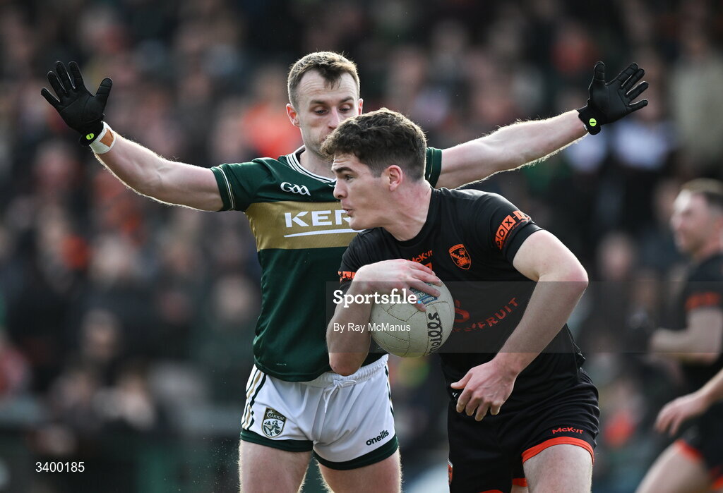 22 March 2026; Jarly Óg Burns of Armagh in action against Tom O'Sullivan of Kerry during the Allianz Football League Division 1 match between Armagh and Kerry at BOX-IT Athletic Grounds in Armagh. Photo by Ray McManus/Sportsfile