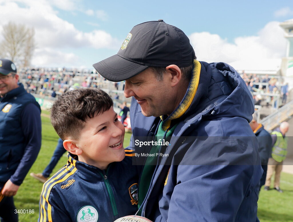 22 March 2026; Meath manager Robbie Brennan celebrates with his son Kyle after the Allianz Football League Division 2 match between Offaly and Meath at Glenisk O'Connor Park in Tullamore, Offaly. Photo by Michael P Ryan/Sportsfile