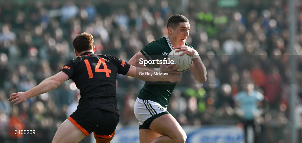 22 March 2026; Joe O'Connor of Kerry is tackled by Jason Duffy of Armagh during the Allianz Football League Division 1 match between Armagh and Kerry at BOX-IT Athletic Grounds in Armagh. Photo by Ray McManus/Sportsfile