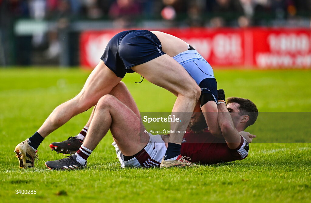22 March 2026; Seán Ó Maoilchiaráin of Galway and Killian McGinnis of Dublin tussle off the ball during the Allianz Football League Division 1 match between Galway and Dublin at Pearse Stadium in Galway. Photo by Piaras Ó Mídheach/Sportsfile
