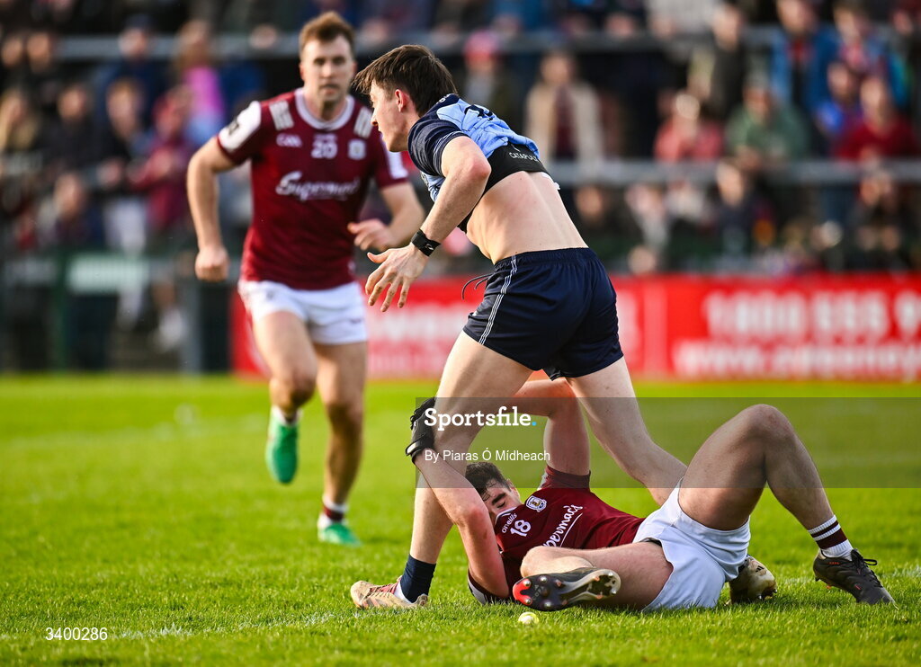 22 March 2026; Seán Ó Maoilchiaráin of Galway and Killian McGinnis of Dublin tussle off the ball during the Allianz Football League Division 1 match between Galway and Dublin at Pearse Stadium in Galway. Photo by Piaras Ó Mídheach/Sportsfile
