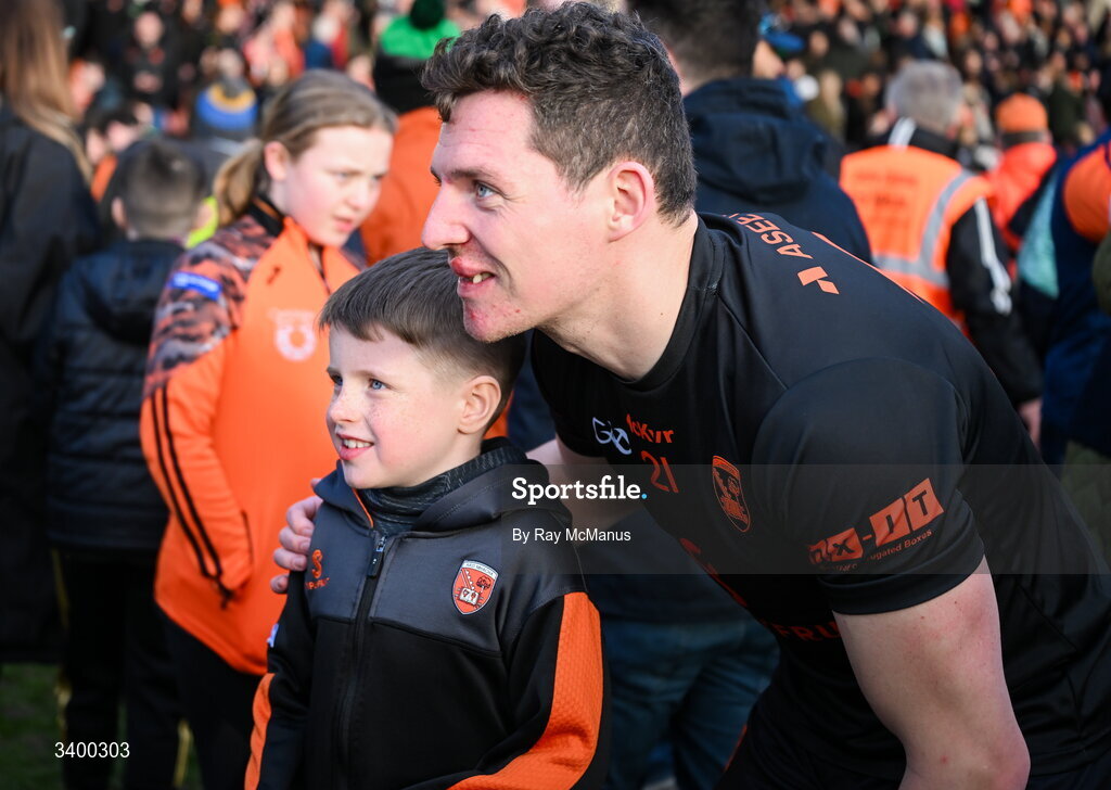 22 March 2026; Paddy Burns of Armagh poses for a picture with a young supporter after the Allianz Football League Division 1 match between Armagh and Kerry at BOX-IT Athletic Grounds in Armagh. Photo by Ray McManus/Sportsfile