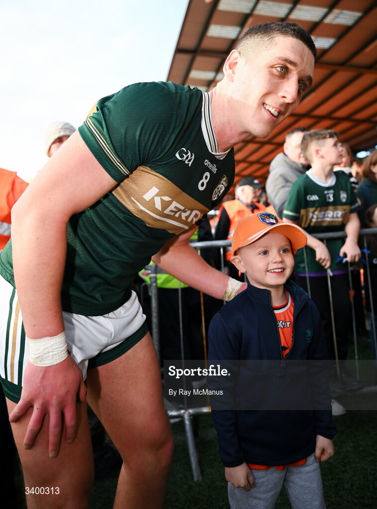 22 March 2026; Joe O'Connor of Kerry poses with a young Armagh supporter after the Allianz Football League Division 1 match between Armagh and Kerry at BOX-IT Athletic Grounds in Armagh. Photo by Ray McManus/Sportsfile