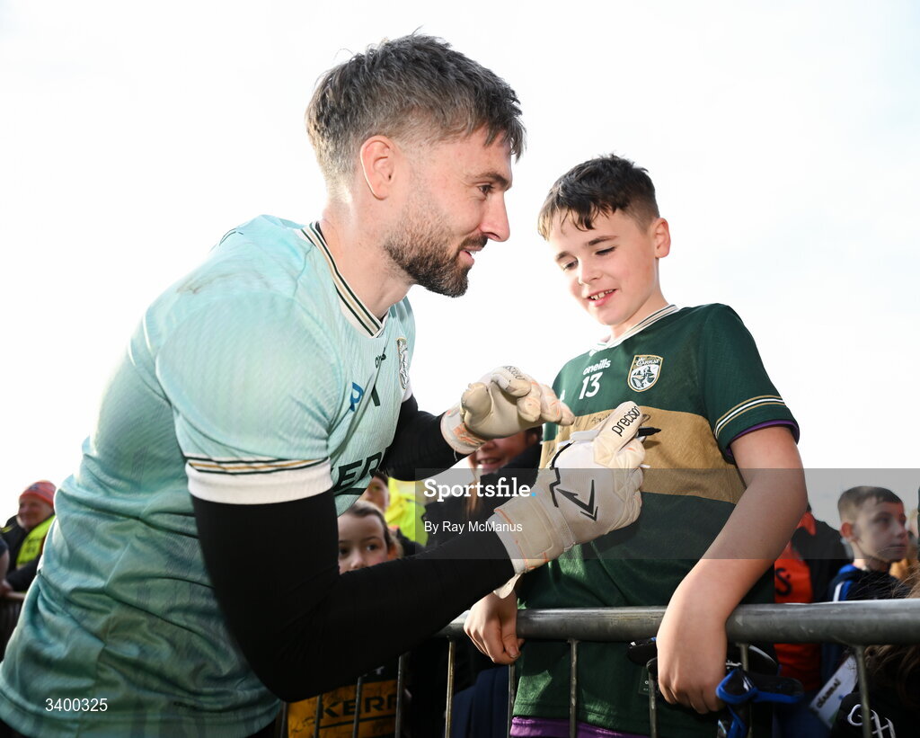 22 March 2026; Kerry goalkeeper Shane Murphy signs the shirt of a young supporter after the Allianz Football League Division 1 match between Armagh and Kerry at BOX-IT Athletic Grounds in Armagh. Photo by Ray McManus/Sportsfile
