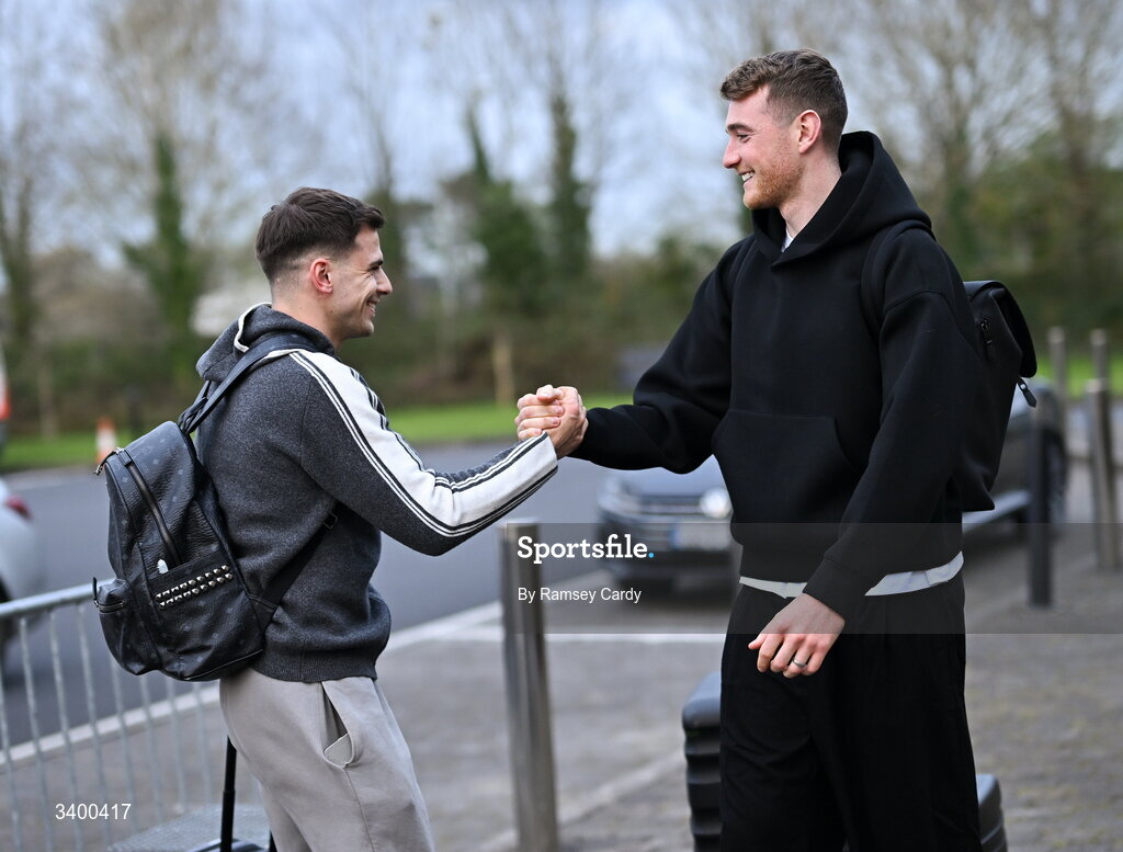 22 March 2026; Republic of Ireland's Mark Travers, right, and Jayson Molumby arrives at their team hotel ahead of their upcoming FIFA World Cup 2026 Playoff games. Photo by Ramsey Cardy/Sportsfile