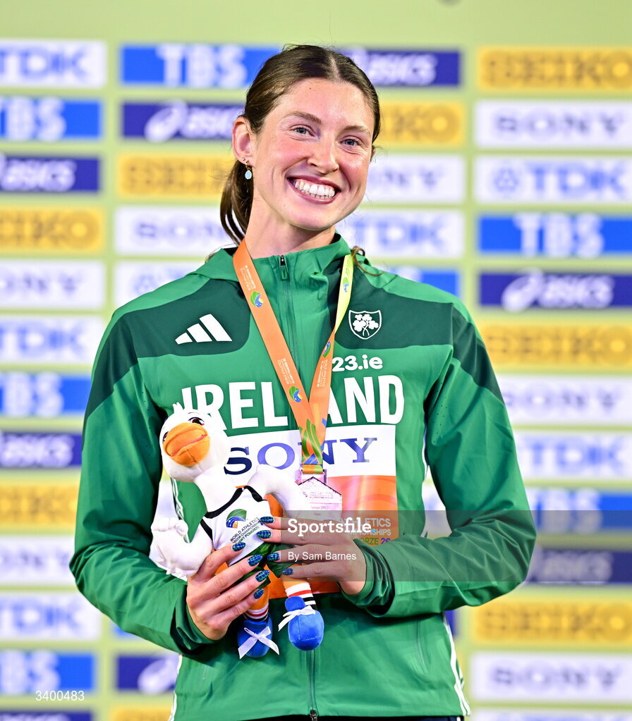 22 March 2026; Kate O'Connor of Ireland celebrates with her bronze medal from the Women's Pentathlon during day three of the World Athletics Indoor Championships at Kujawsko-Pomorska Arena in Torun, Poland. Photo by Sam Barnes/Sportsfile