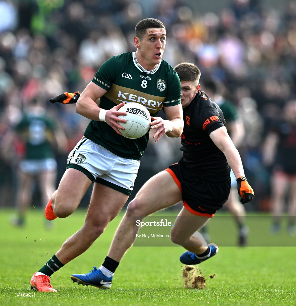22 March 2026; Joe O'Connor of Kerry slips past Gareth Murphy of Armagh during the Allianz Football League Division 1 match between Armagh and Kerry at BOX-IT Athletic Grounds in Armagh. Photo by Ray McManus/Sportsfile