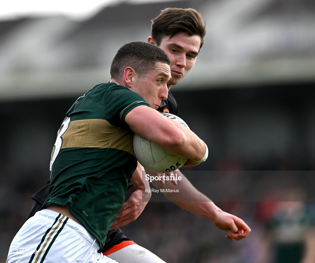 22 March 2026; Joe O'Connor of Kerry is tackled by Ben Crealey of Armagh during the Allianz Football League Division 1 match between Armagh and Kerry at BOX-IT Athletic Grounds in Armagh. Photo by Ray McManus/Sportsfile