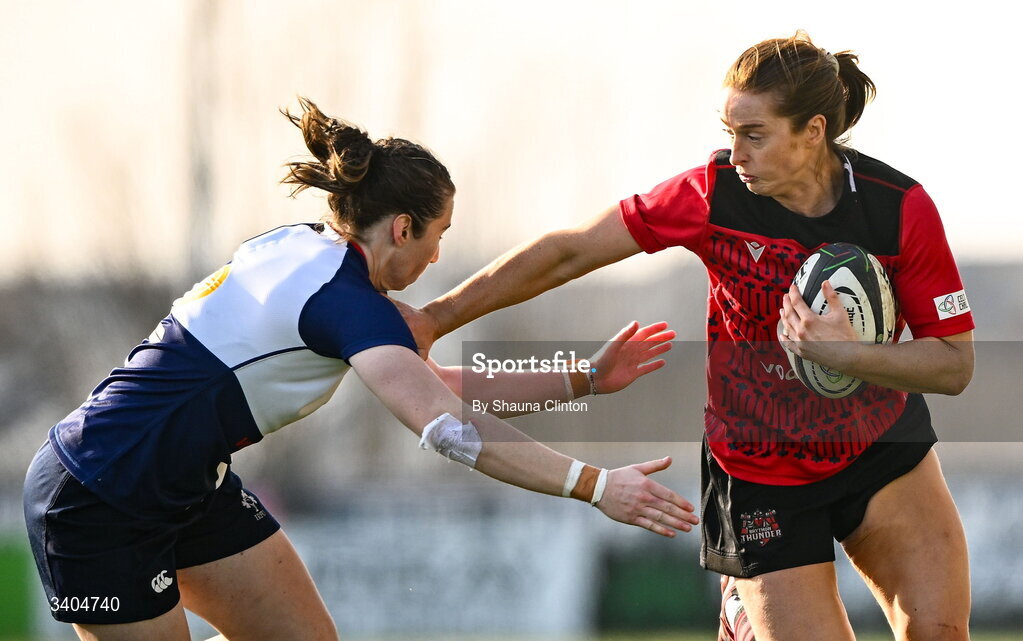 21 March 2026; Lisa Neumann of Brython Thunder is tackled by Eve Higgins of Wolfhounds during the Celtic Challenge semi-final match between Wolfhounds and Brython Thunder at Dexcom Stadium in Galway. Photo by Shauna Clinton/Sportsfile