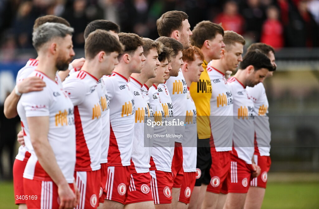 22 March 2026; The Tyrone players stand for the anthem before the Allianz Football League Division 2 match between Tyrone and Cork at O'Neills Healy Park in Omagh, Tyrone. Photo by Oliver McVeigh/Sportsfile