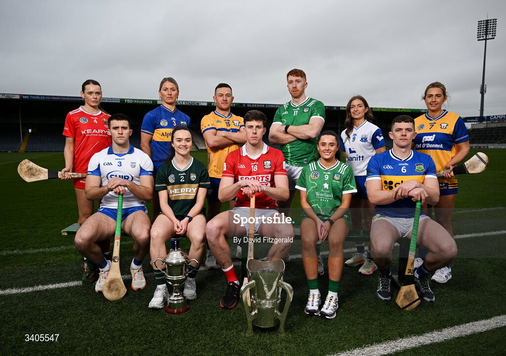26 March 2026; Munster senior hurlers from left, Mark Fitzgerald of Waterford, David Reidy of Clare, Robert Downey of Cork, Cian Lynch of Limerick and Ronan Maher of Tipperary with Munster Senior camogie players, from left, Meabh Cahalane of Cork, Mairead Eviston of Tipperary, Rachel McCarthy of Kerry, Orlaith Kelliher of Limerick, Lorraine Bray of Waterford and Claire Hehir of Clare in attendance for the Munster GAA Senior Hurling and Football Championship launch 2026 at FBD Semple Stadium in Thurles, Tipperary. Photo by David Fitzgerald/Sportsfile