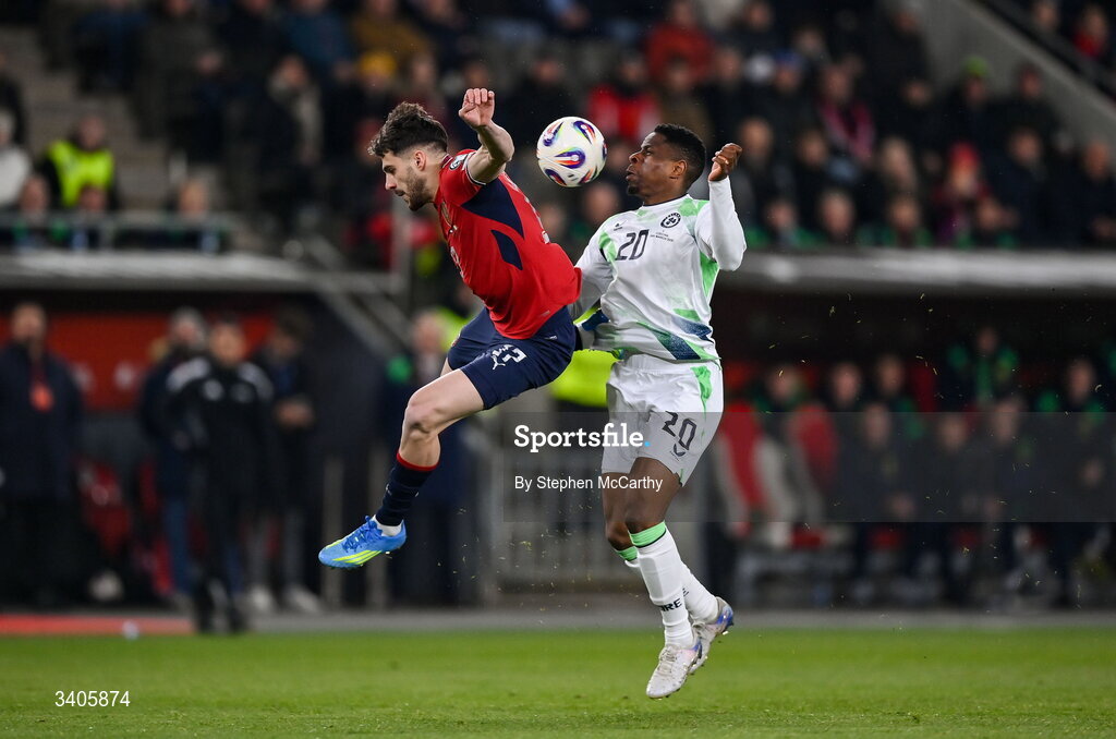 26 March 2026; Chiedozie Ogbene of Republic of Ireland in action against David Jurásek of Czechia during the FIFA World Cup 2026 European Qualifiers play-off semi-final match between Czechia and Republic of Ireland at Fortuna Arena in Prague, Czechia. Photo by Stephen McCarthy/Sportsfile