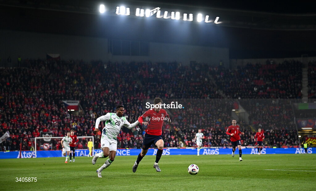 26 March 2026; Chiedozie Ogbene of Republic of Ireland in action against Ladislav Krejcí of Czechia during the FIFA World Cup 2026 European Qualifiers play-off semi-final match between Czechia and Republic of Ireland at Fortuna Arena in Prague, Czechia. Photo by Seb Daly/Sportsfile