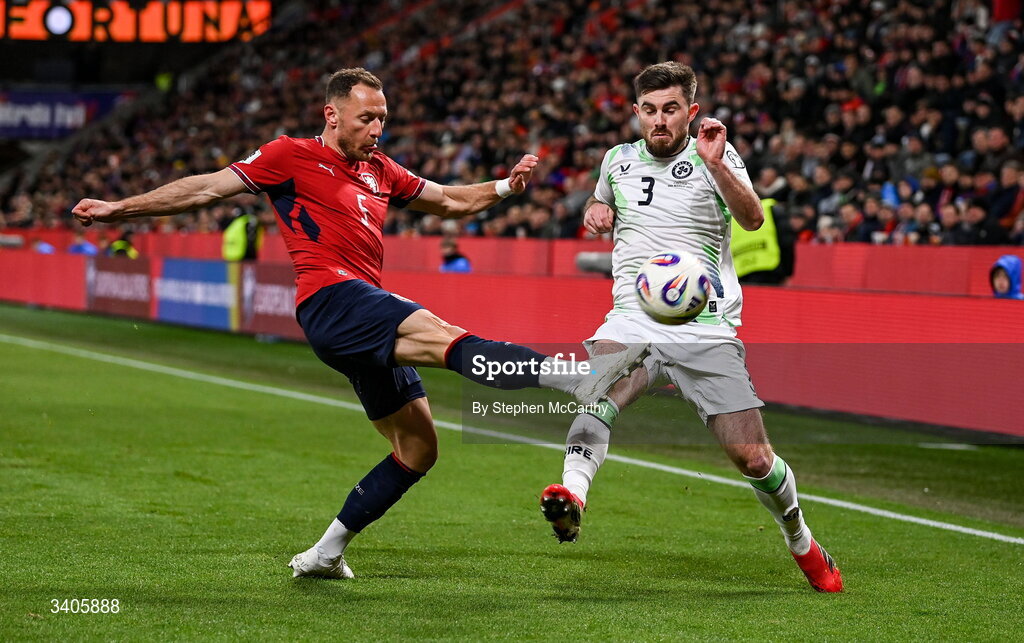 26 March 2026; Ryan Manning of Republic of Ireland in action against Vladimír Coufal of Czechia during the FIFA World Cup 2026 European Qualifiers play-off semi-final match between Czechia and Republic of Ireland at Fortuna Arena in Prague, Czechia. Photo by Stephen McCarthy/Sportsfile